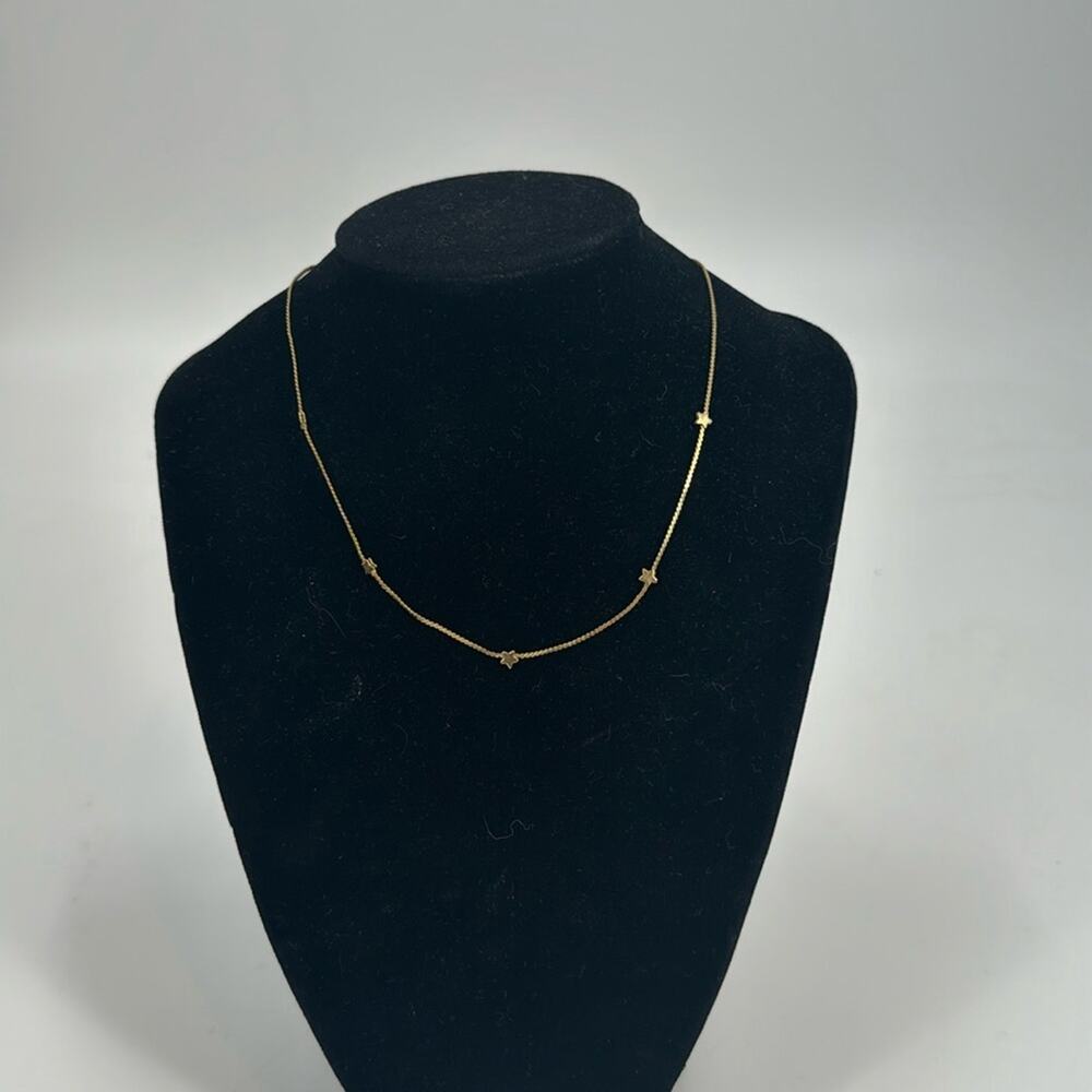 Goldtone star choker necklace